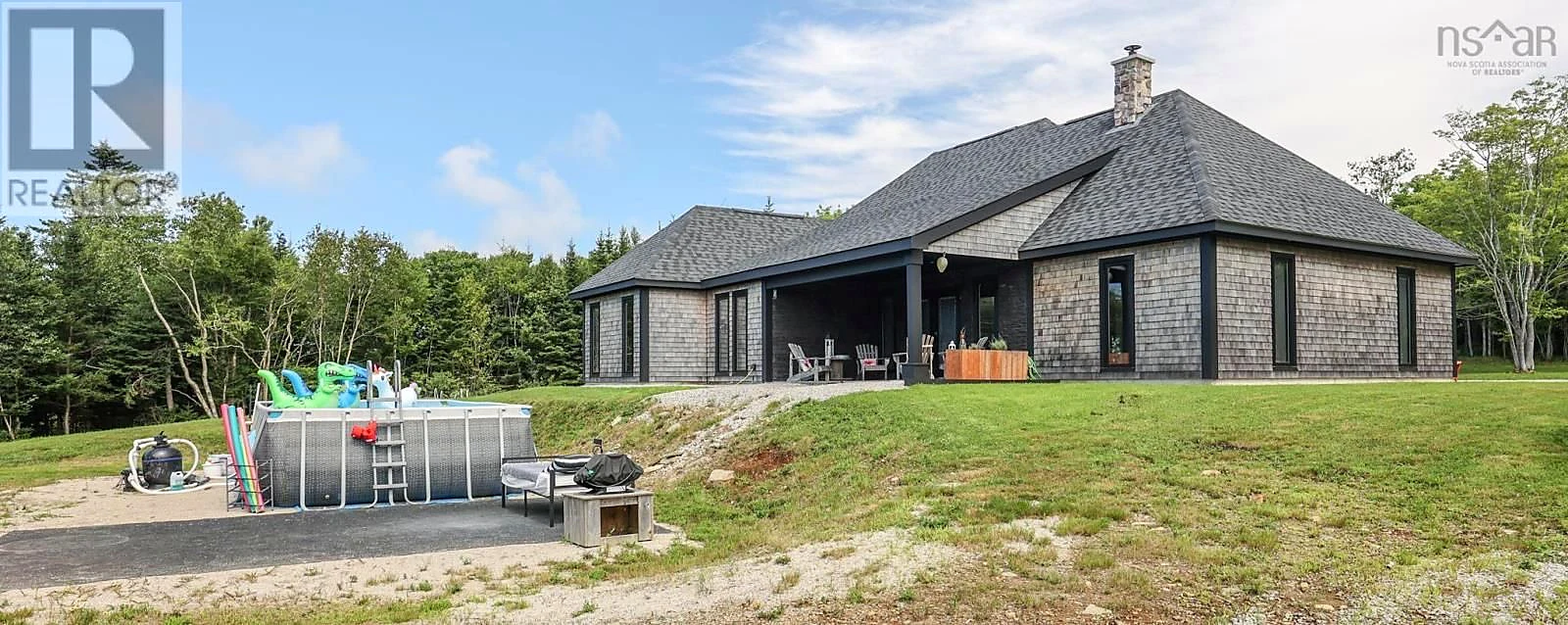 Rear exterior and pool — 319 Edson Foote Road Polished Photos